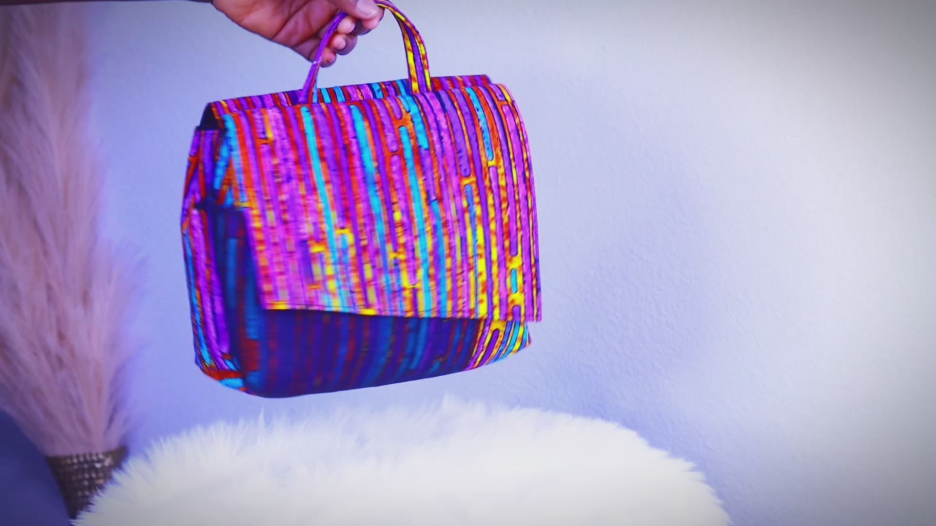 Load video: Video showcasing african print bag